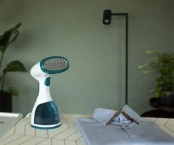 Tomado TSH1201W - Kledingstomer - 1200 Watt - RVS Zool - Wit/turquoise -Reinigingsapparaten Winkel 1200x1003 5